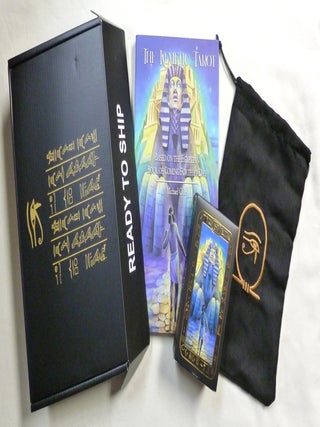 The Kemetic Tarot. A Boxed set Comprising the Book "The Kemetic Tarot. Based On the Egyptian Book of Coming Forth by Day" a Boxed Tarot Deck and a Black Silk-like Cloth Bag, Embroidered with an Ankh inside a Cartouche, in Which to Keep the Deck. All in original box - sealed in shrinkwrap.